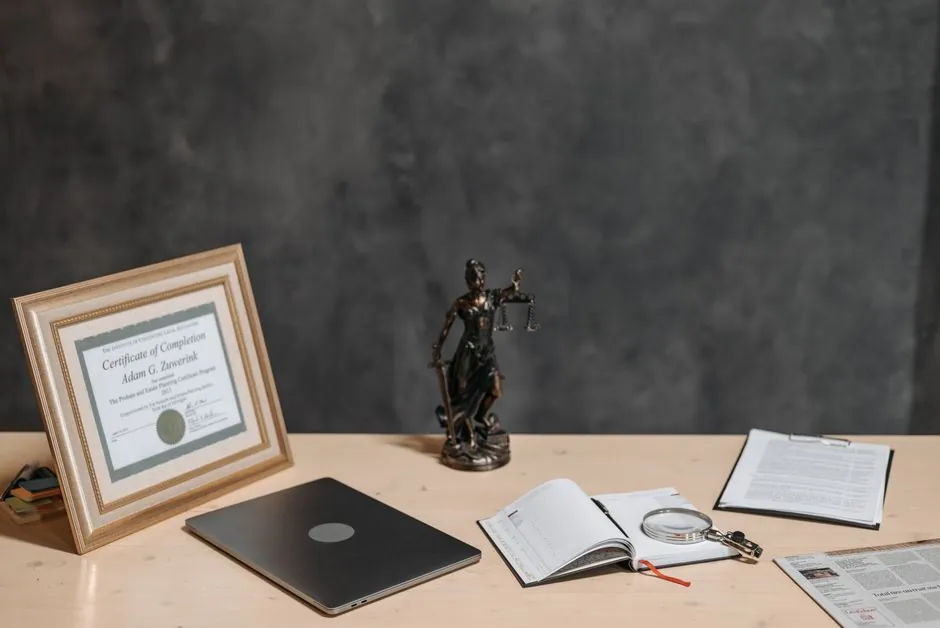 A lawyer reviewing documents at a desk in a law office.